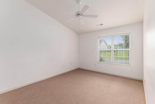 8209 Farm Crossing Cir, Powell, OH 43065 - unfurnished room featuring light colored carpet, lofted ceiling, and ceiling fan