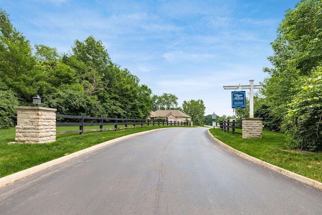 8209 Farm Crossing Cir, Powell, OH 43065 - view of asphalt road with curbs
