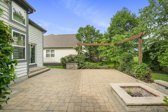 8020 Glenmore Dr, Powell, OH 43065 - view of patio / terrace featuring an outdoor fire pit