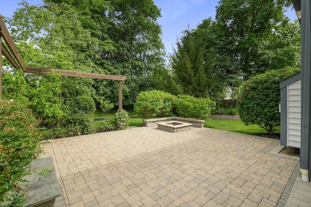 8020 Glenmore Dr, Powell, OH 43065 - view of patio / terrace with a fire pit