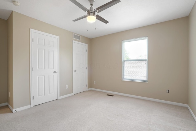 8020 Glenmore Dr, Powell, OH 43065 - unfurnished bedroom featuring light colored carpet and ceiling fan