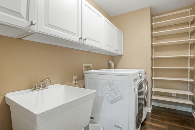 8020 Glenmore Dr, Powell, OH 43065 - laundry room featuring cabinet space, dark wood finished floors, and washer and clothes dryer