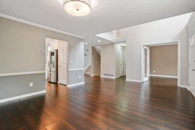 8020 Glenmore Dr, Powell, OH 43065 - unfurnished living room featuring stairway, ornamental molding, dark wood finished floors, and recessed lighting