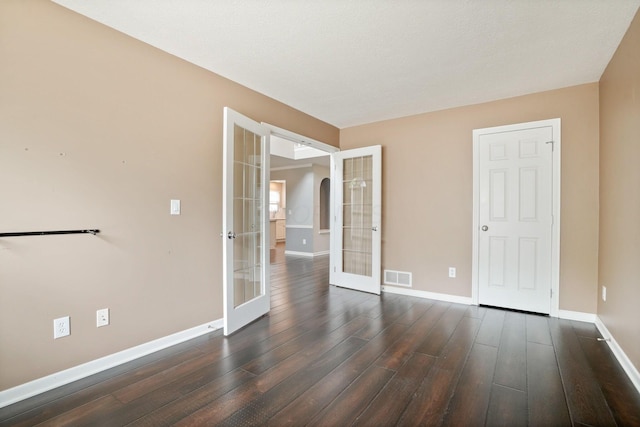 8020 Glenmore Dr, Powell, OH 43065 - spare room with french doors and dark wood-type flooring