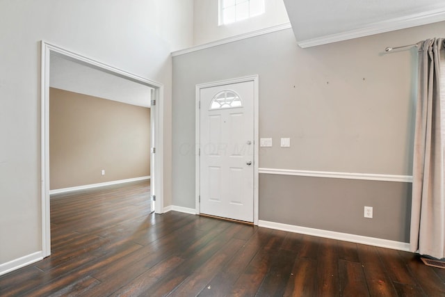 8020 Glenmore Dr, Powell, OH 43065 - entrance foyer with dark wood finished floors and ornamental molding
