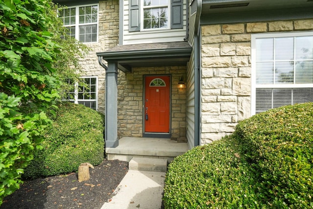 8020 Glenmore Dr, Powell, OH 43065 - doorway to property with stone siding