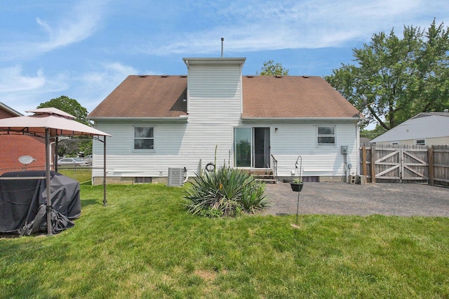 3101 Lewis Rd, Columbus, OH 43207 - rear view of property with a gazebo, entry steps, and a patio area