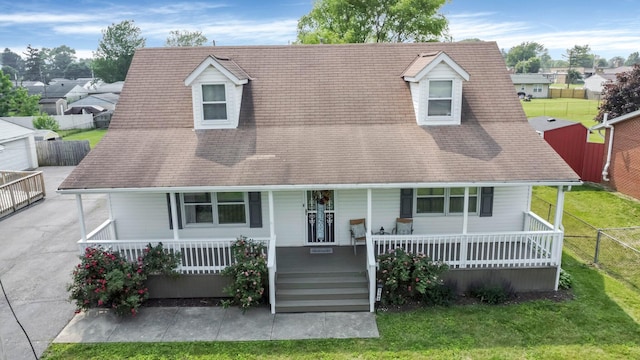 3101 Lewis Rd, Columbus, OH 43207 - cape cod-style house with a porch and roof with shingles