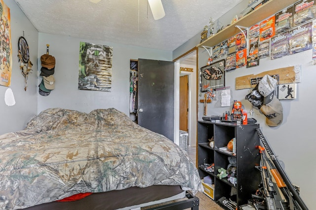 718 Bradwell Dr, Columbus, OH 43207 - bedroom with a textured ceiling and ceiling fan