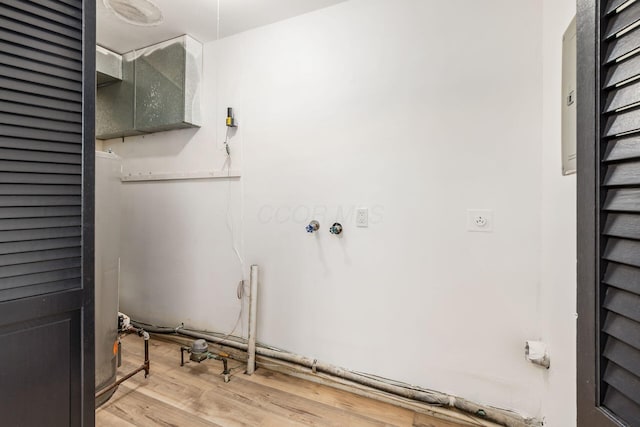 340 Danhurst Rd, Columbus, OH 43228 - laundry room featuring wood finished floors and electric dryer hookup