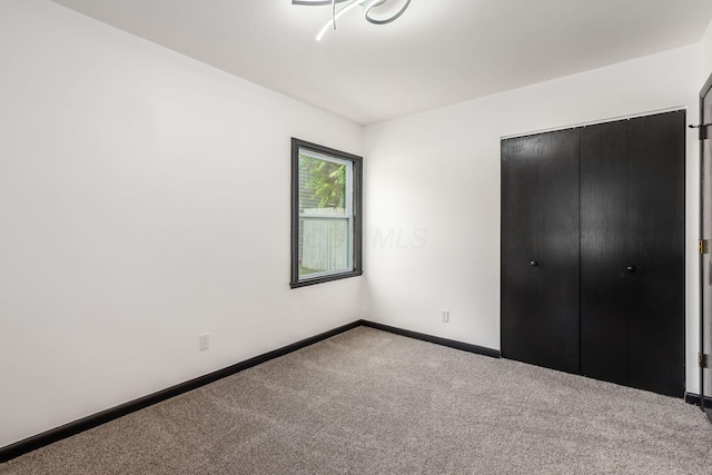 340 Danhurst Rd, Columbus, OH 43228 - unfurnished bedroom featuring carpet floors and a closet