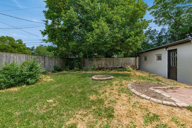 340 Danhurst Rd, Columbus, OH 43228 - fenced backyard featuring an outdoor fire pit