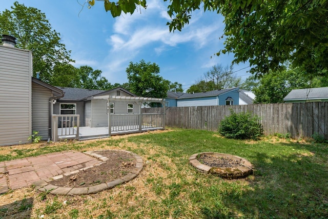 340 Danhurst Rd, Columbus, OH 43228 - fenced backyard featuring an outdoor fire pit and a wooden deck
