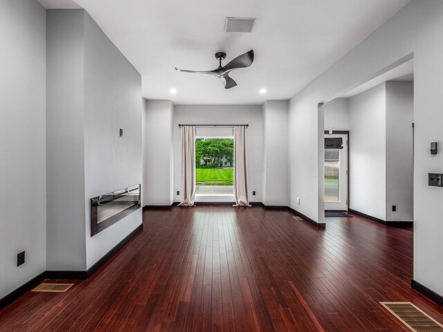 241 N 17th St, Columbus, OH 43203 - unfurnished living room with ceiling fan, hardwood / wood-style flooring, and recessed lighting