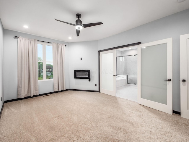 241 N 17th St, Columbus, OH 43203 - unfurnished bedroom featuring carpet flooring, french doors, recessed lighting, and heating unit