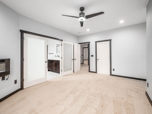 241 N 17th St, Columbus, OH 43203 - unfurnished bedroom with french doors, light carpet, recessed lighting, connected bathroom, and ceiling fan