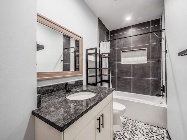 241 N 17th St, Columbus, OH 43203 - full bath featuring vanity, shower / bath combo with shower curtain, and tile patterned floors