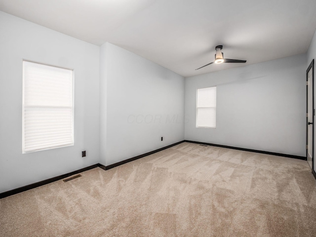 241 N 17th St, Columbus, OH 43203 - carpeted spare room with ceiling fan and baseboards