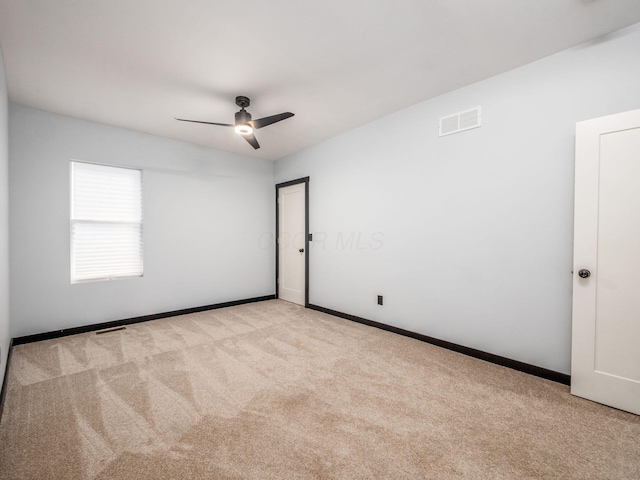 241 N 17th St, Columbus, OH 43203 - empty room with carpet flooring and a ceiling fan