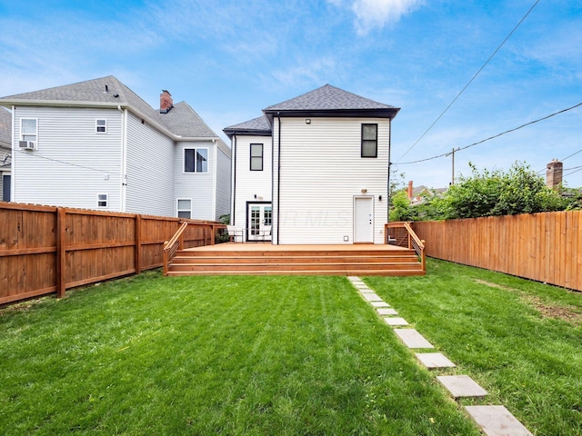 241 N 17th St, Columbus, OH 43203 - back of house featuring a fenced backyard, a deck, and a shingled roof