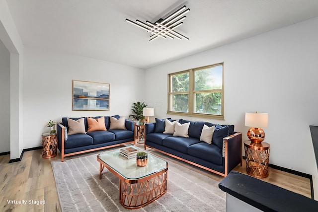 1908 Lost Valley Rd, Powell, OH 43065 - living room featuring light wood finished floors and baseboards