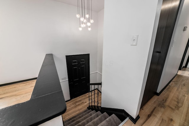 1908 Lost Valley Rd, Powell, OH 43065 - staircase featuring wood finished floors