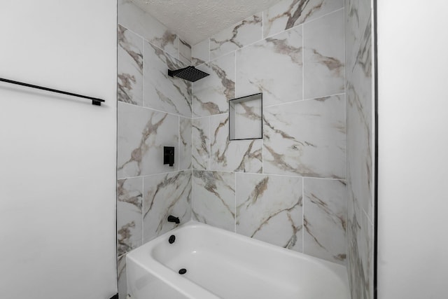 1908 Lost Valley Rd, Powell, OH 43065 - bathroom featuring shower / tub combination and a textured ceiling
