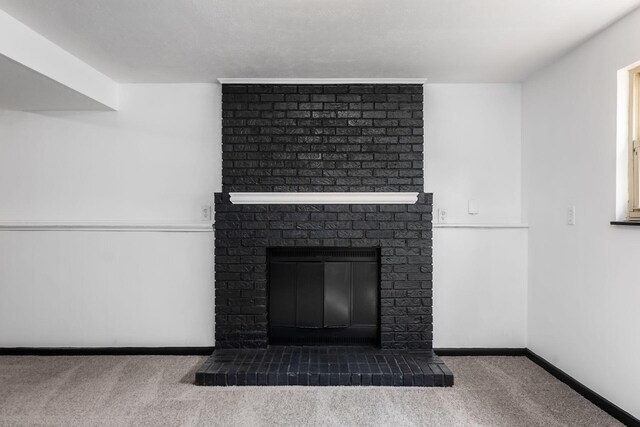 1908 Lost Valley Rd, Powell, OH 43065 - detailed view of a brick fireplace and carpet