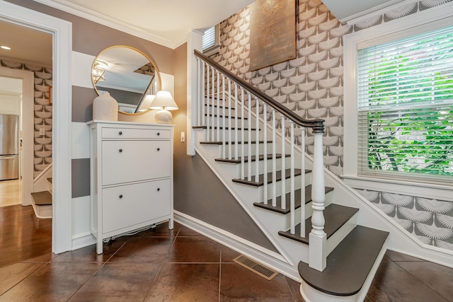 233 Preston Rd, Columbus, OH 43209 - stairs with crown molding and tile patterned flooring