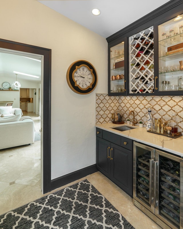 233 Preston Rd, Columbus, OH 43209 - indoor wet bar featuring beverage cooler, tasteful backsplash, and light tile patterned floors