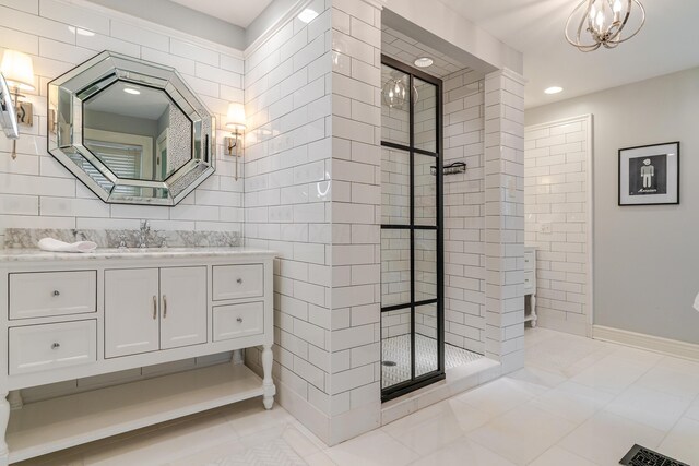 233 Preston Rd, Columbus, OH 43209 - bathroom featuring a tile shower, a chandelier, vanity, and recessed lighting