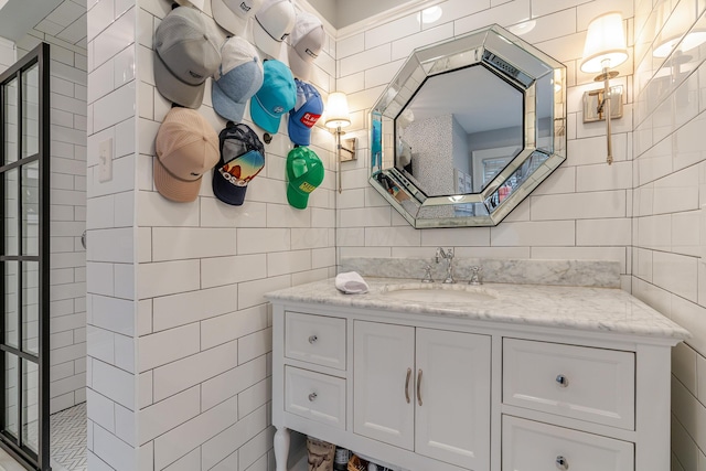 233 Preston Rd, Columbus, OH 43209 - full bathroom featuring tile walls, vanity, and a tile shower