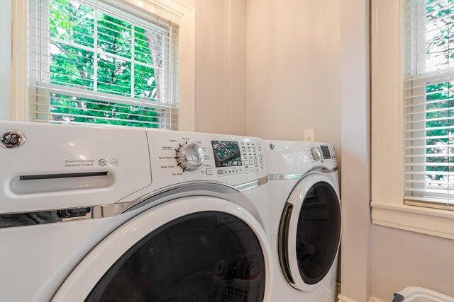 233 Preston Rd, Columbus, OH 43209 - washroom with separate washer and dryer and healthy amount of natural light