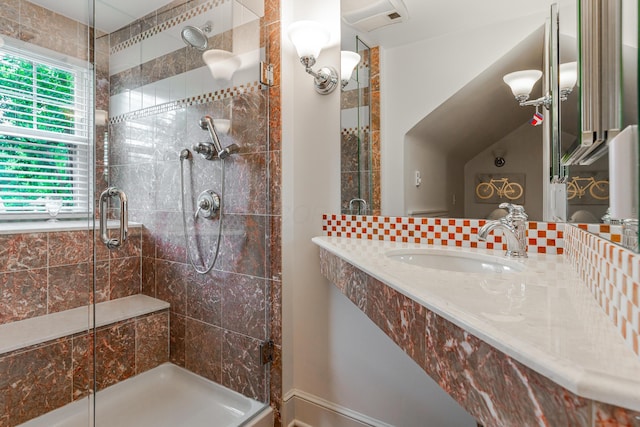 233 Preston Rd, Columbus, OH 43209 - bathroom featuring a shower stall, decorative backsplash, and vanity