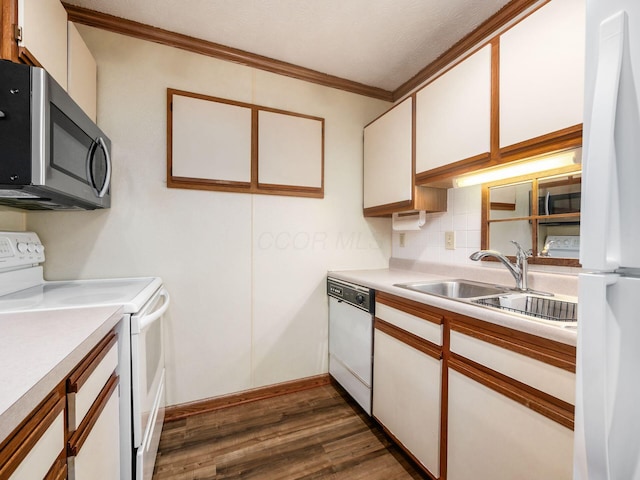 4401 Hammerton Dr Unit 13A, Columbus, OH 43228 - kitchen featuring white appliances, light countertops, crown molding, dark wood-type flooring, and backsplash