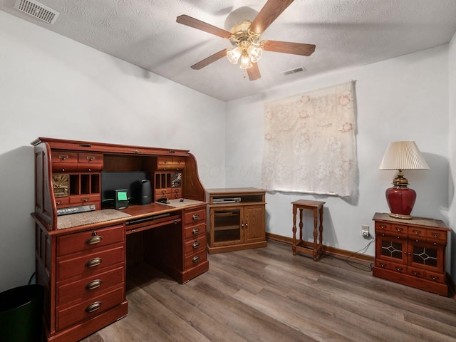4401 Hammerton Dr Unit 13A, Columbus, OH 43228 - office space featuring wood finished floors, ceiling fan, and a textured ceiling