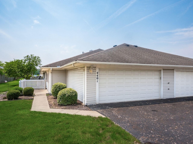 4401 Hammerton Dr Unit 13A, Columbus, OH 43228 - view of home's exterior featuring roof with shingles