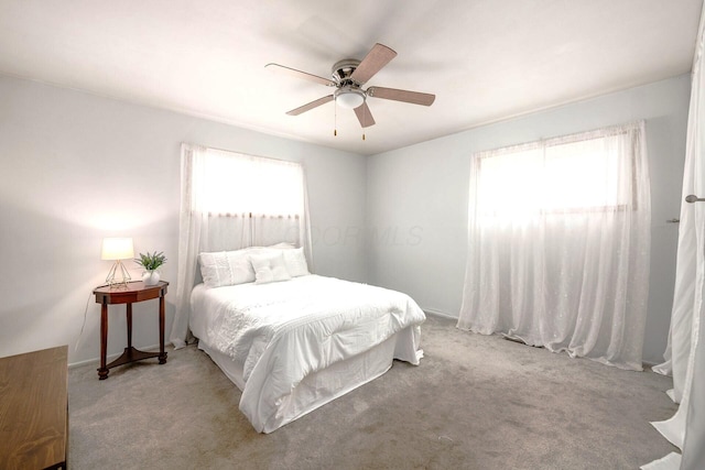4388 Allen Dr, Columbus, OH 43213 - carpeted bedroom featuring multiple windows and ceiling fan
