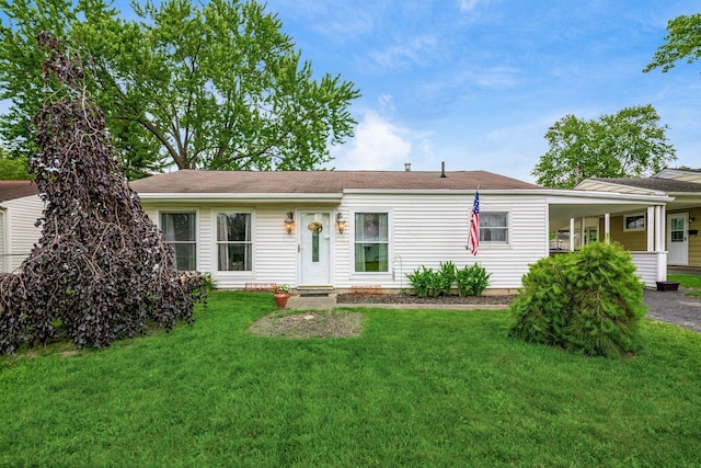 4388 Allen Dr, Columbus, OH 43213 - ranch-style house featuring a front lawn, an attached carport, and driveway