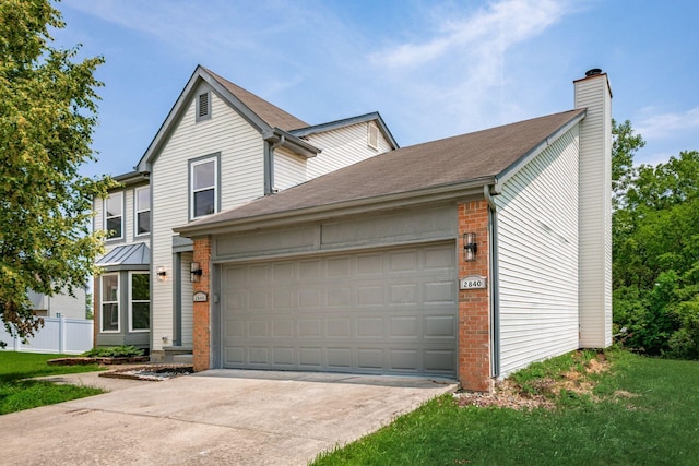 2840 Harnet Ct, Columbus, OH 43231 - traditional-style home with a chimney, brick siding, driveway, an attached garage, and roof with shingles