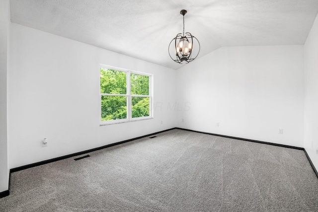 2840 Harnet Ct, Columbus, OH 43231 - unfurnished room featuring a chandelier, carpet flooring, and lofted ceiling