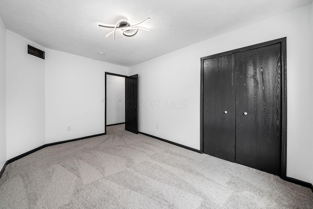 2840 Harnet Ct, Columbus, OH 43231 - unfurnished bedroom with carpet floors and a closet