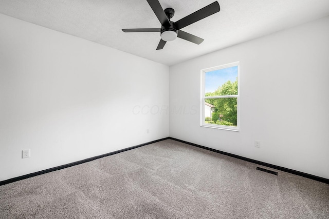 2840 Harnet Ct, Columbus, OH 43231 - unfurnished room with carpet floors and a ceiling fan
