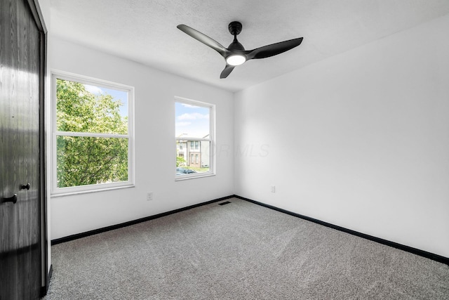 2840 Harnet Ct, Columbus, OH 43231 - carpeted empty room with baseboards and a ceiling fan