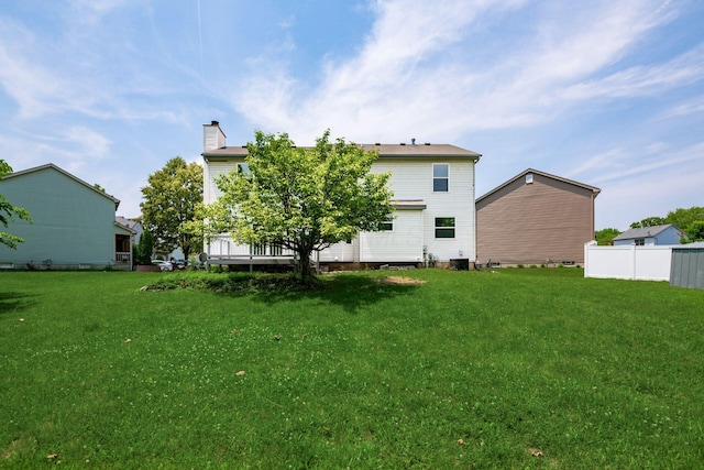 2840 Harnet Ct, Columbus, OH 43231 - back of property featuring a chimney