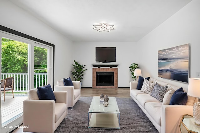 2840 Harnet Ct, Columbus, OH 43231 - living area featuring wood finished floors and a tiled fireplace