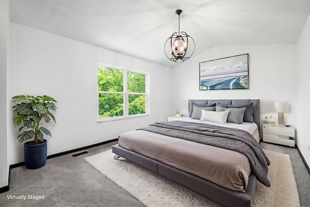 2840 Harnet Ct, Columbus, OH 43231 - carpeted bedroom featuring a chandelier and vaulted ceiling