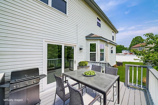 2840 Harnet Ct, Columbus, OH 43231 - wooden terrace with outdoor dining space and grilling area