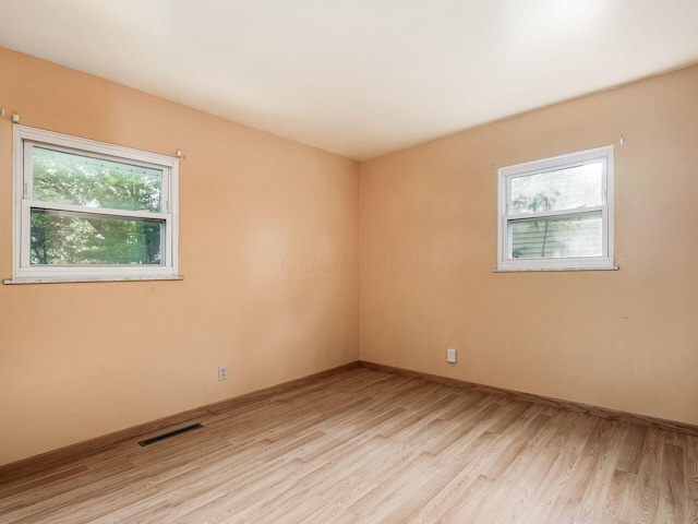 668 Kenilworth Ct, Columbus, OH 43230 - empty room with light wood finished floors and healthy amount of natural light