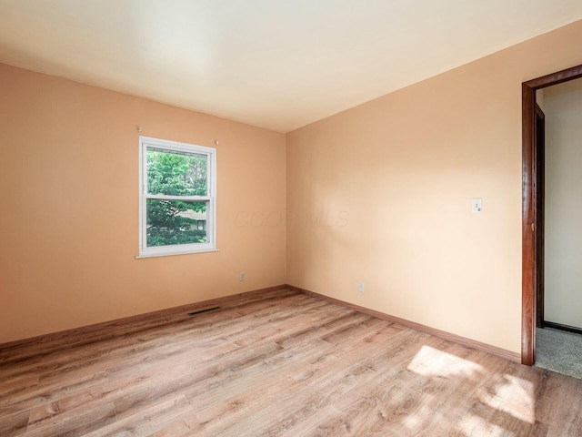 668 Kenilworth Ct, Columbus, OH 43230 - empty room with wood finished floors and baseboards